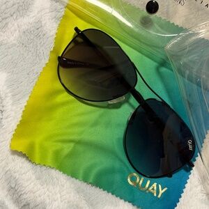 Used. Mint Condition. Quay Sunglasses with 2 case and cloth.